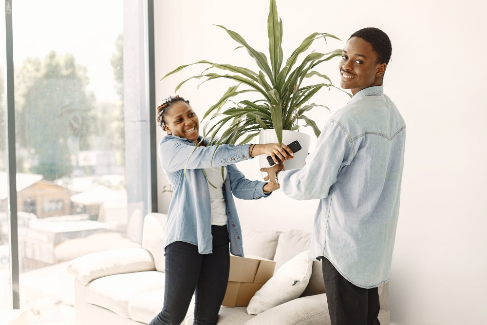 Young couple moving new home.